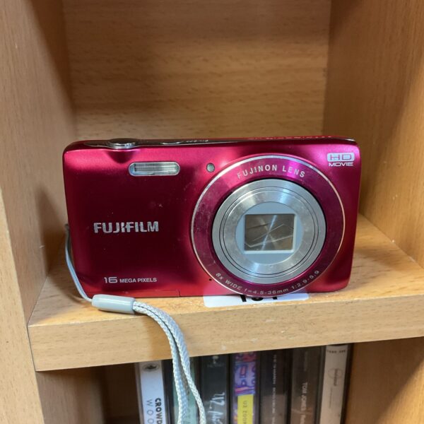 Red Fujifilm FinePix JZ digital camera with zoom lens.