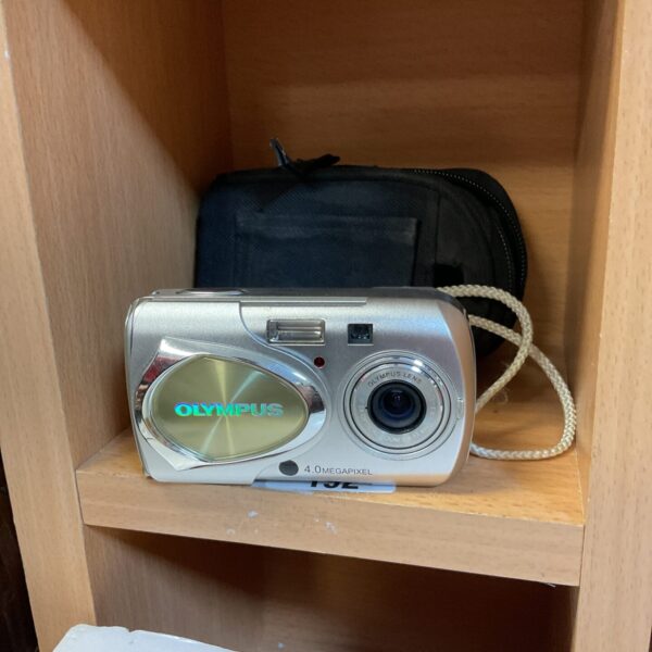 Silver Olympus mju 400 digital camera, compact point and shoot.