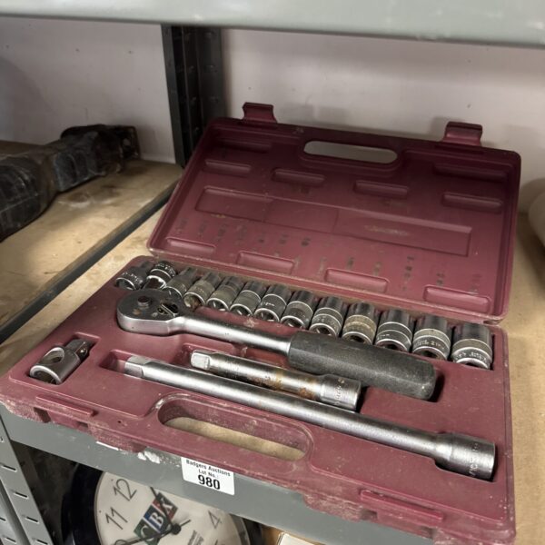 Vintage Roebuck ratchet and socket set in red case.