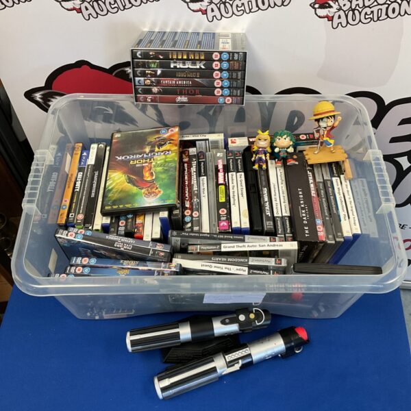 Mixed DVD and game lot including PlayStation titles.