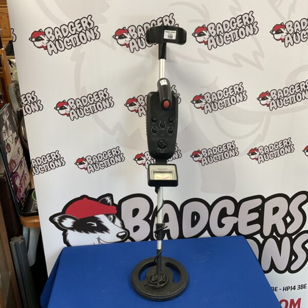 Vintage child’s metal detector toy for treasure hunting.