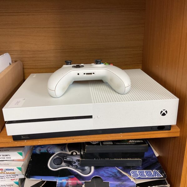 White Microsoft Xbox One S console with controller.