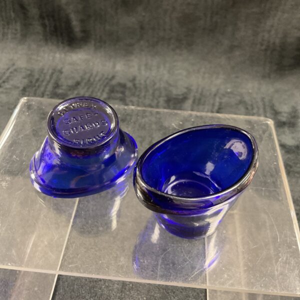 Vintage 1930s Optrex Cobalt blue eye wash glass for hygienic eye care.