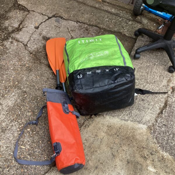 Rolled Itiwit inflatable kayak ready for storage or transport.