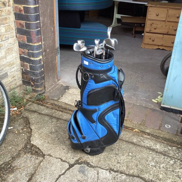 Dunlop golf clubs with bag, vintage sports equipment.