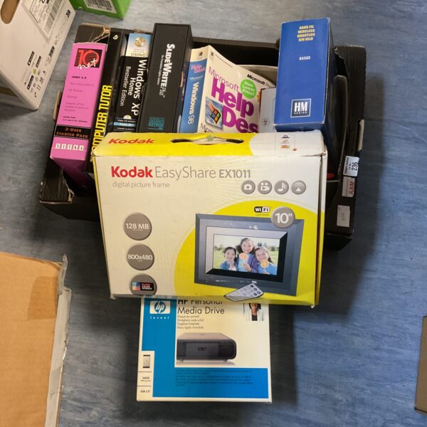 Vintage software and computing lot with HP Media Drive visible.