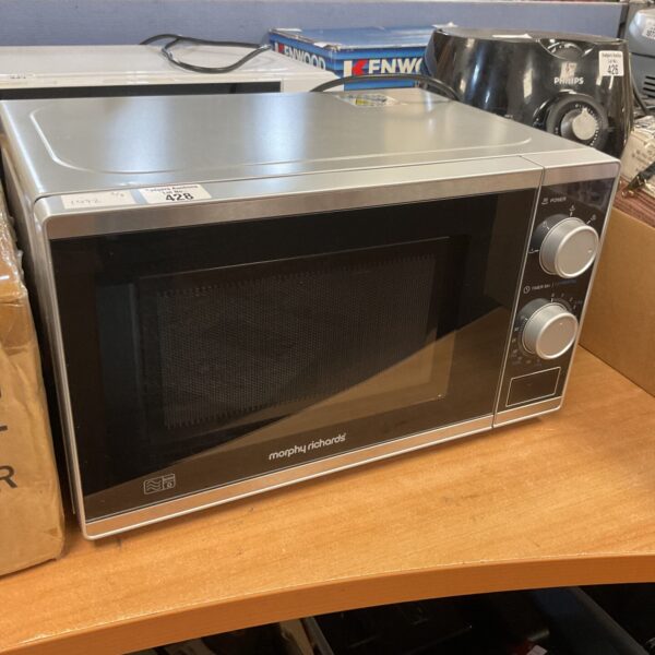 Front view of a vintage Morphy Richards microwave oven.