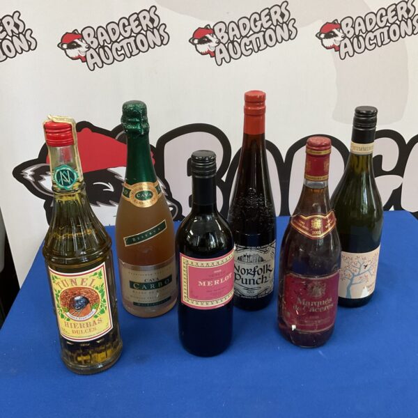 Six bottles of wine in a wine lot collection.