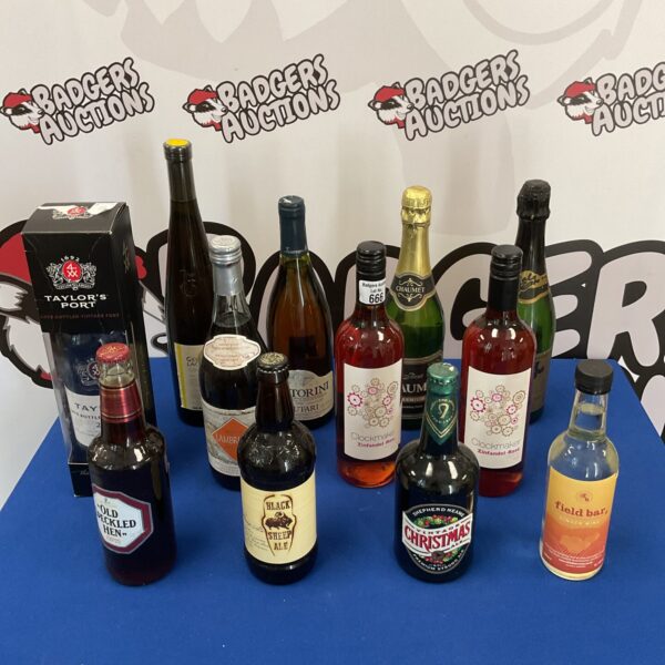 Mixed lot of twelve alcohol bottles, including Taylors Port.