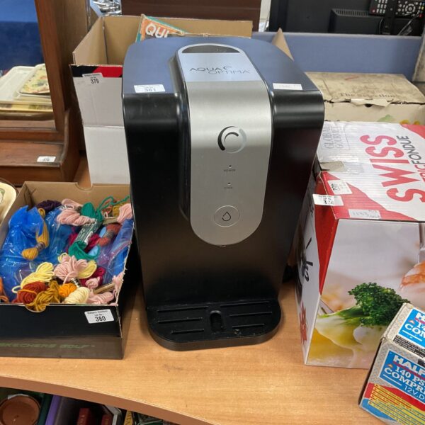 Side view of Aqua Optima water dispenser appliance.