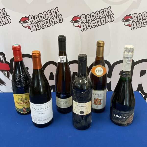 Wine lot featuring Sancerre and El Rastro bottles for collectors.