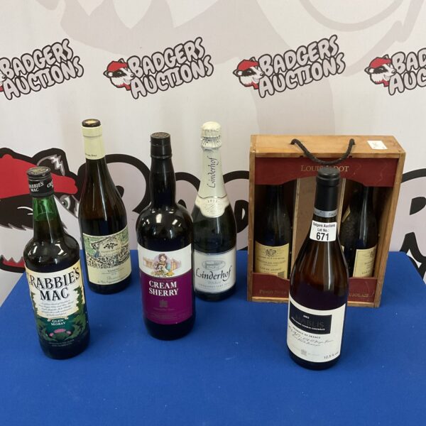 A collection of six wine bottles, including cream sherry and Linderhoff.