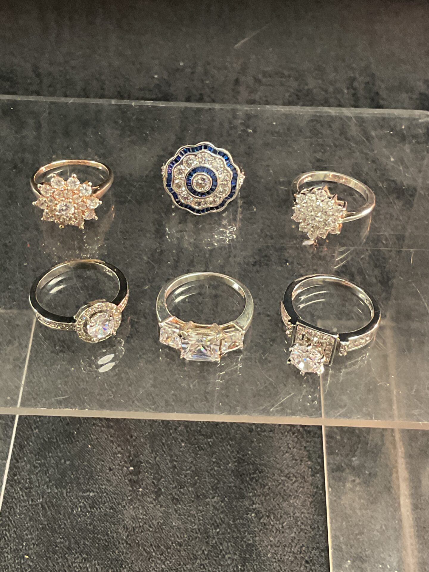 821 Six 925 Silver rings set with white colour stones size o p Q i