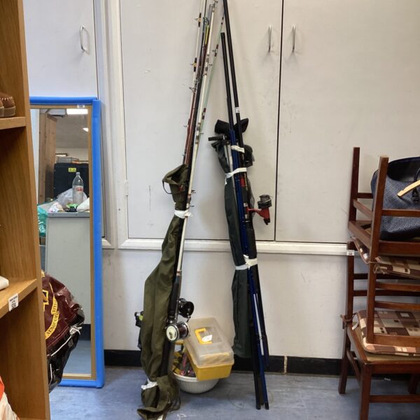 Bundle of fishing rods and tackle box for sea fishing.