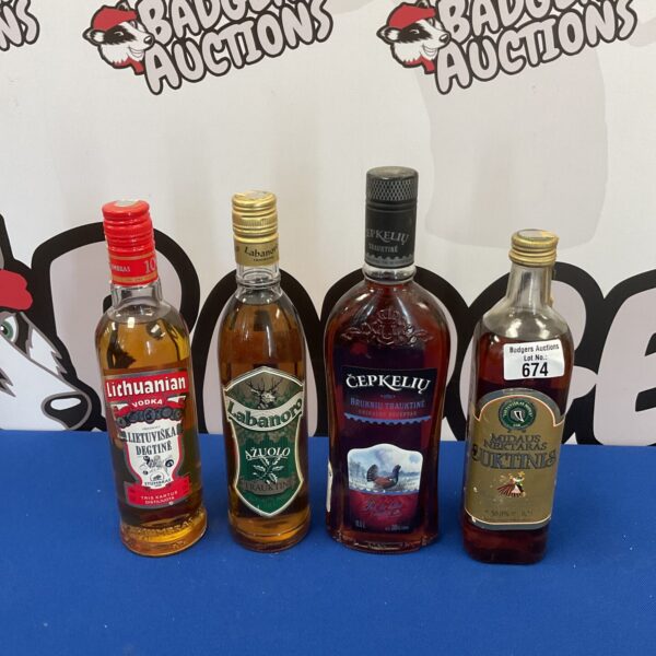 Lithuanian alcohol lot featuring vintage vodka and Labanoro bottles.