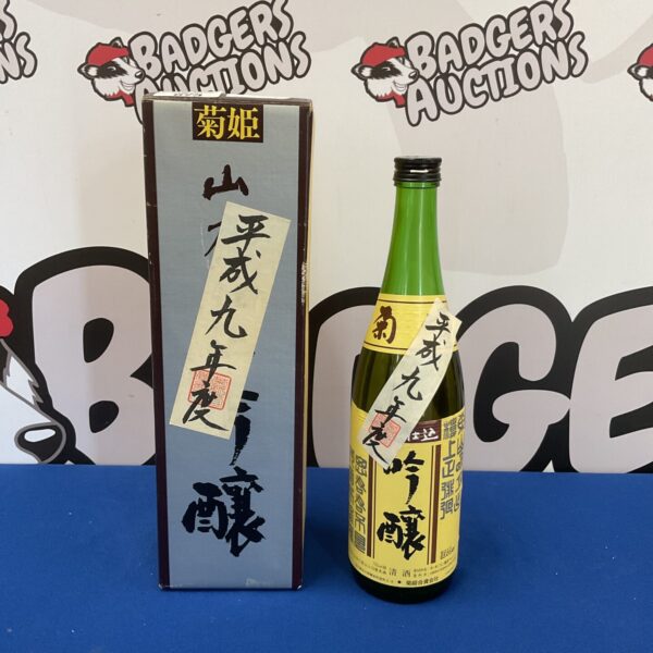 Sealed bottle of Japanese sake with original packaging.