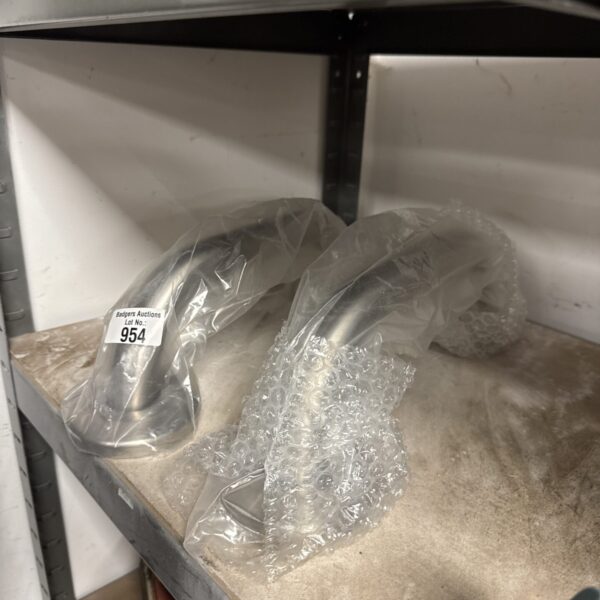 New stainless steel grab rails in protective packaging for bathroom safety.