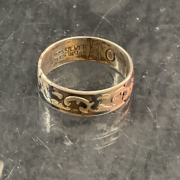 Vintage Siamese silver ring with floral enamel detailing.