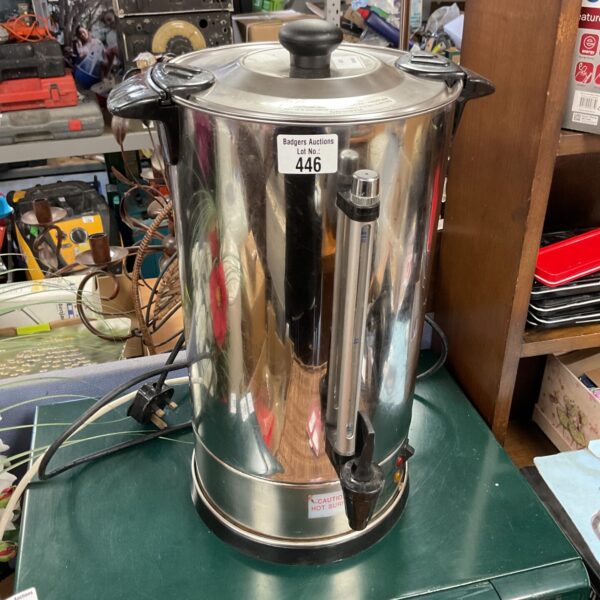 Stainless steel hot water urn for catering and large gatherings.