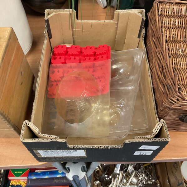Vintage lot of plastic chocolate moulds for confectionery making.