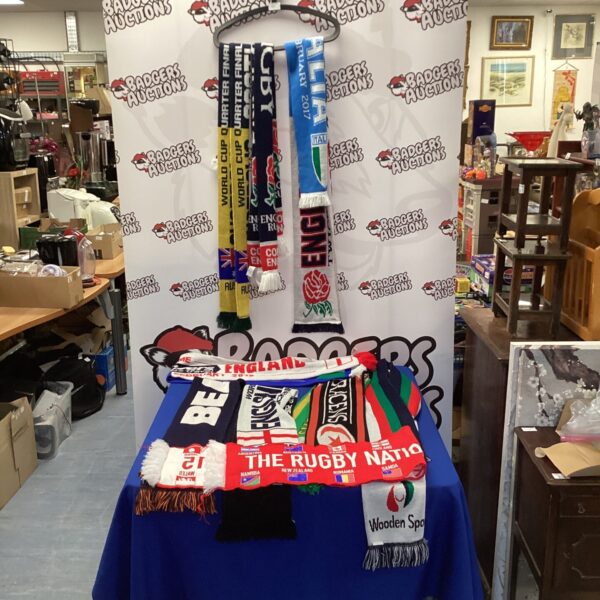Bundle of colourful rugby scarves including Australia and Scotland.
