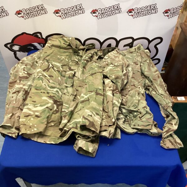 Lot of British Army MTP camouflage jackets for sale.