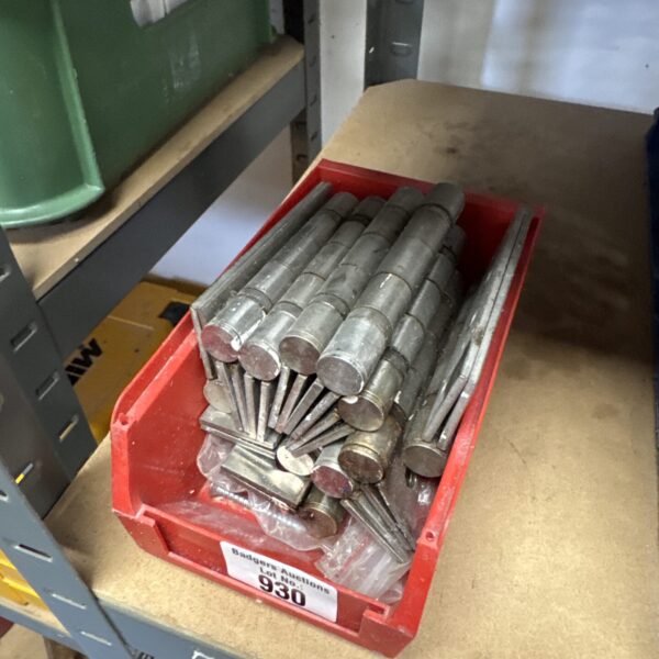 Lot of heavy-duty metal hinges for doors and gates.