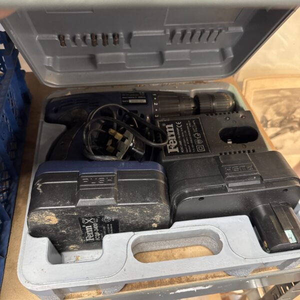 Fern cordless drill in its original carry case, showing the battery and charger.