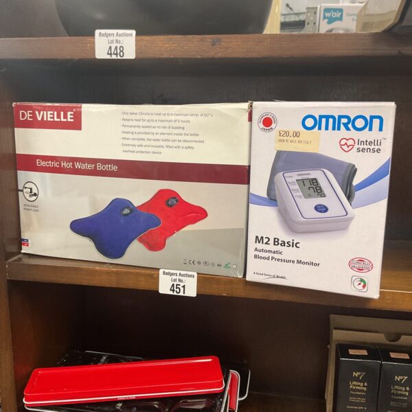 Omron M2 Basic blood pressure monitor and Deville electric hot water bottle lot.