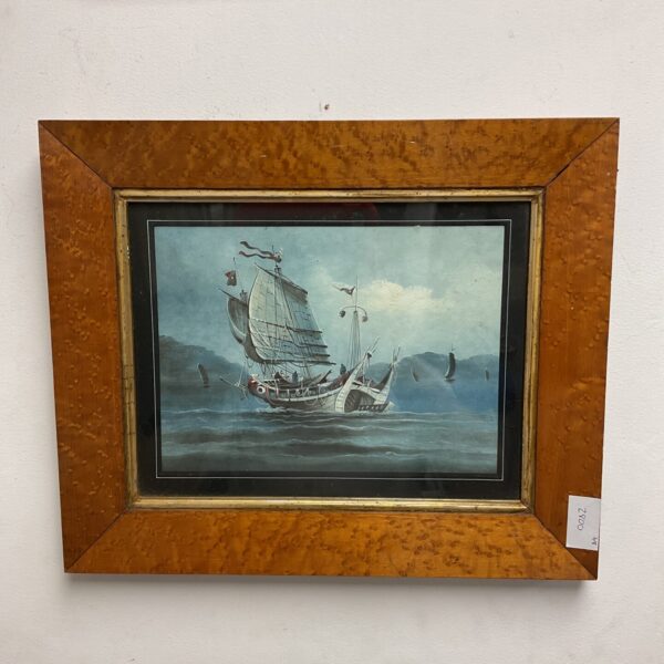 Antique oil painting of an oriental sailing ship at sea.