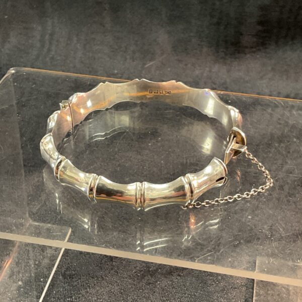 Hallmarked silver bamboo bracelet with a hinged clasp.