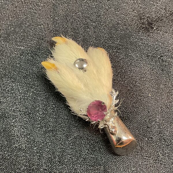 Vintage Scottish stag brooch with amethyst stone detail.