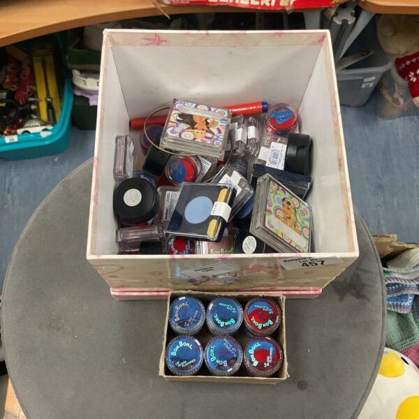 Mixed beauty product lot including Bon Bon cosmetics.