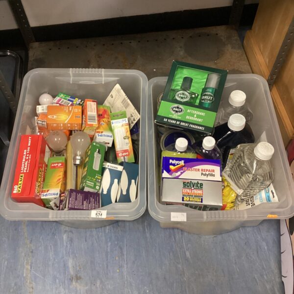 Mixed lot of household chemicals and light bulbs for DIY projects.