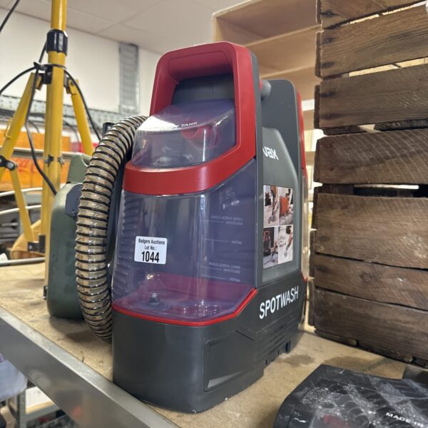 Vax Spotwash steam cleaner handheld carpet and floor cleaning appliance.