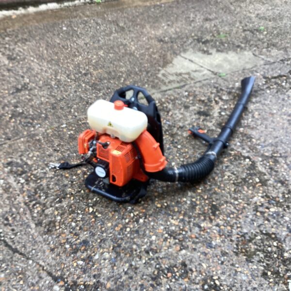 Used Magun petrol leaf blower for garden maintenance and clearing debris.