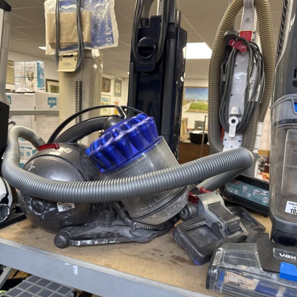 Vintage Dyson Stowaway DC16 handheld vacuum cleaner for sale.