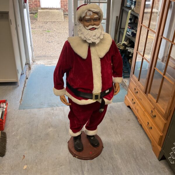 Life size Santa decoration for festive Christmas displays.