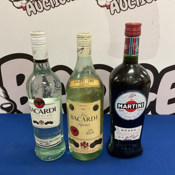 Sealed bottles of Bacardi White Rum and Martini Rosso for collectors.