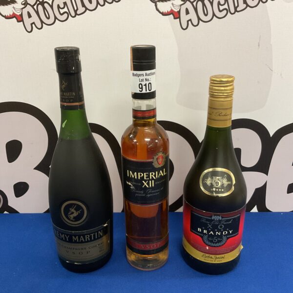 Sealed Remy Martin Champagne Cognac bottle in alcohol lot.