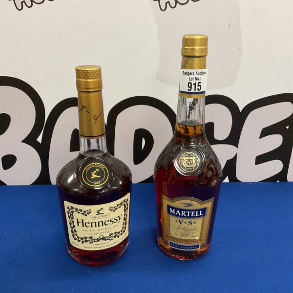 Sealed bottles of Hennessy and Martell fine cognac for collectors.
