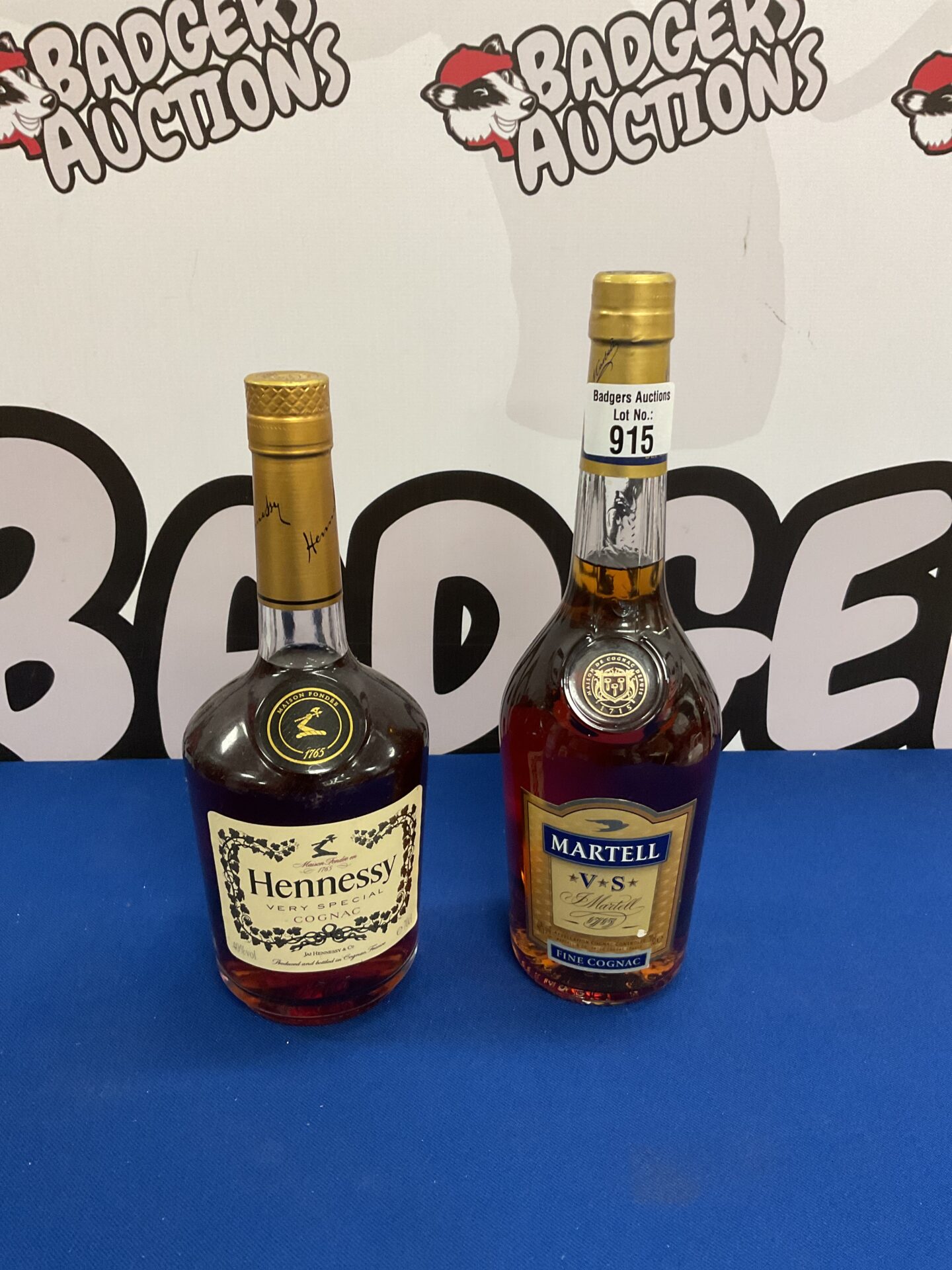 915 Sealed bottles of hennessy & matrel fine cognac