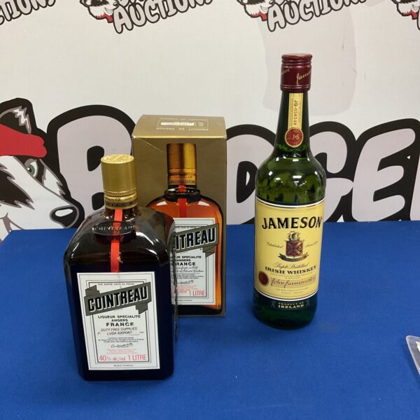 Sealed bottles of Jameson Irish Whiskey and Cointreau orange liqueur.