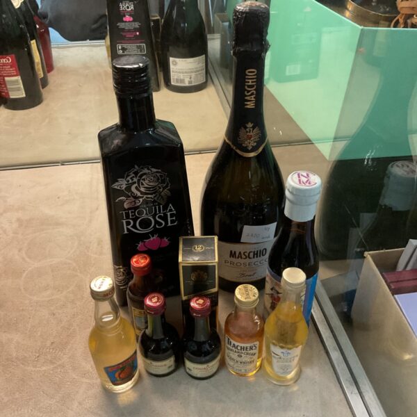 Alcohol selection including Tequila Rose and Maschio Prosecco bottles.