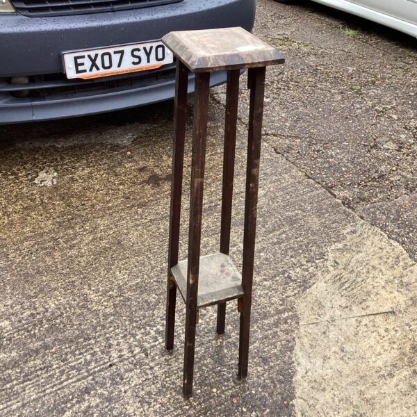 Antique mahogany plant stand with square top and lower shelf.