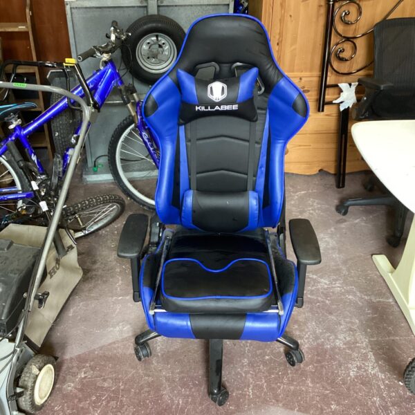 Blue and black KillaBee gaming chair with footrest extended.