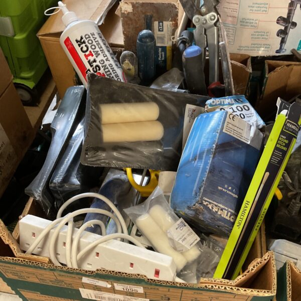 Mixed lot of DIY tools and wood glue for home improvement.