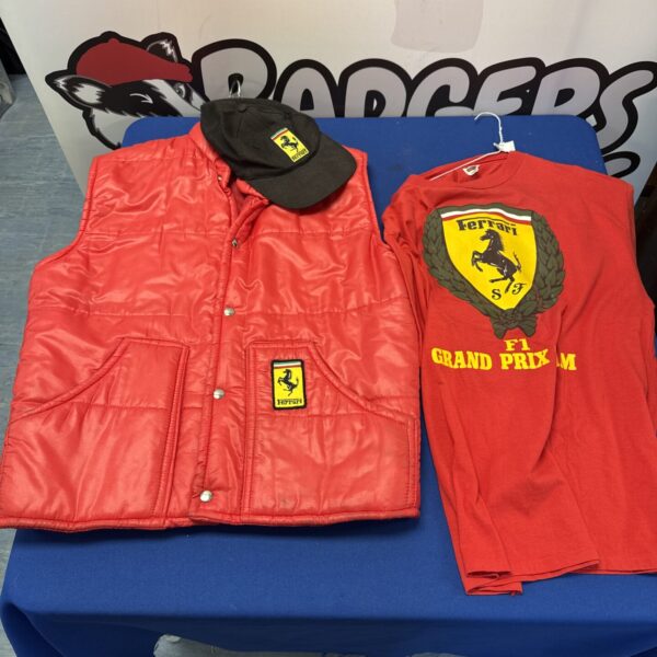 Ferrari F1 clothing lot including t-shirt, body warmer and cap.