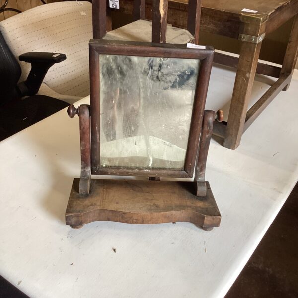 Antique dressing table mirror with wooden frame needing repair.