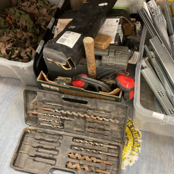 Mixed tool lot in a plastic tray, including drill bits.